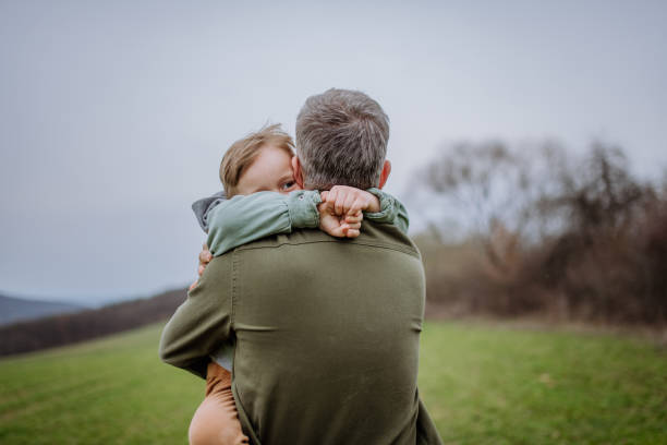 istock Father and his little son on a walk in nature. 1486473081