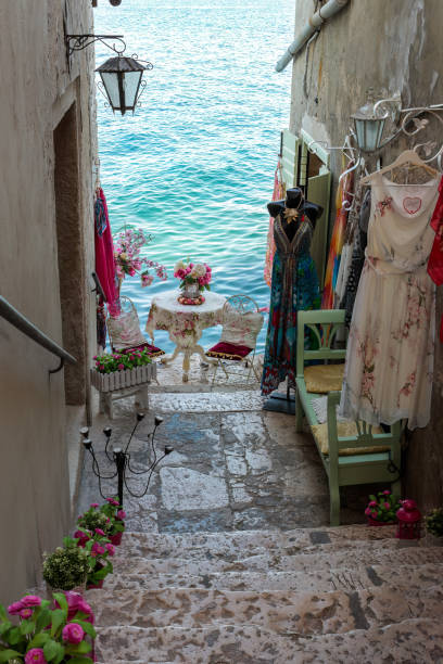 Decorated tiny street in Rovinj on the Croatian coastline Decorated tiny street in Rovinj on the Croatian coastline. rovinj harbor stock pictures, royalty-free photos & images