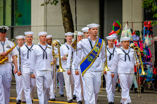Portland, Oregon, USA - June 11, 2022: Navy Band Northwest in the Grand Floral Parade, during Portland Rose Festival 2022.
