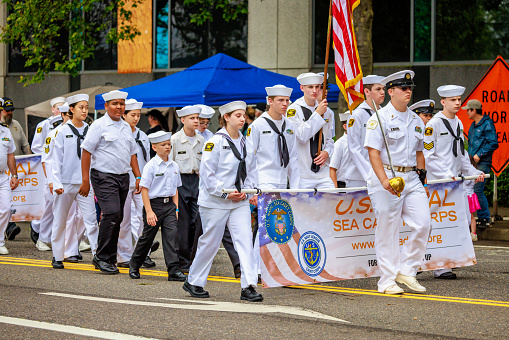 Portland, Oregon, USA - June 11, 2022: United States Naval Sea Cadet Corps in the Grand Floral Parade, during Portland Rose Festival 2022.
