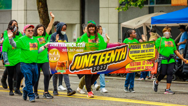 Portland Grand Floral Parade 2022 Portland, Oregon, USA - June 11, 2022: Juneteenth in the Grand Floral Parade, during Portland Rose Festival 2022. photo png pictures stock pictures, royalty-free photos & images