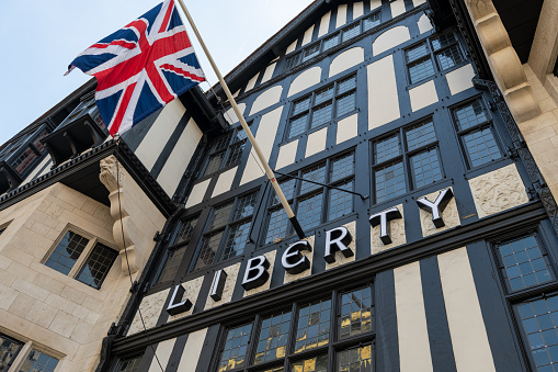 London. UK- 04.09.2023. The name sign on the facade of the famous British luxury department store Liberty.