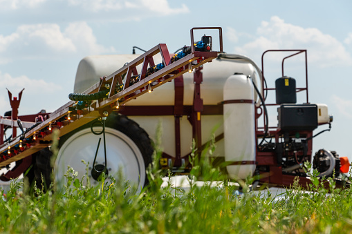 Machine for spraying pesticides and herbicides on the field