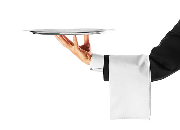 Waiter Waiter with a silver plate tray stock pictures, royalty-free photos & images