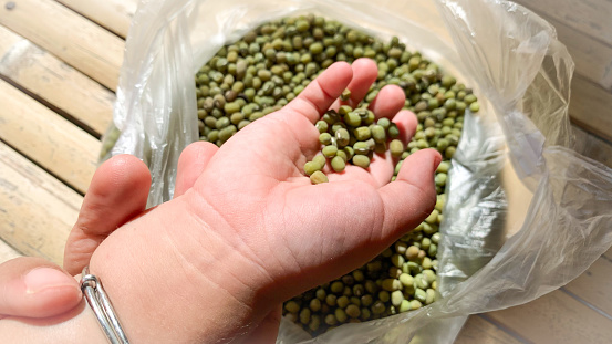 Mung beans or green bean seeds in a plastic bag.