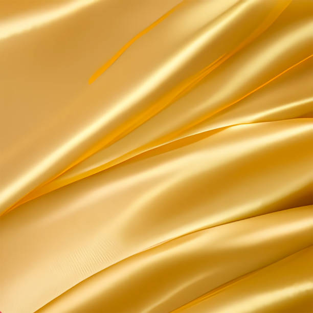 istock Texture of golden silk fabric with folds 1486500967