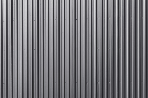 Striped wave Zine Aluminium steel metal sheet line industry wall texture pattern for tile background.