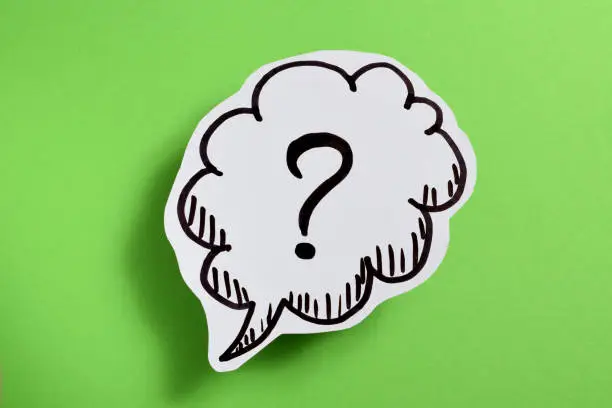 Question mark on green background
