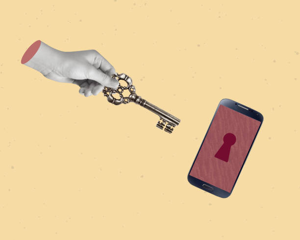 istock Creative collage of hand with a key and mobile telephone. 1486506290