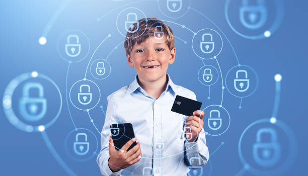istock Cheerful boy with phone and credit card, cybersecurity interface 1486506442