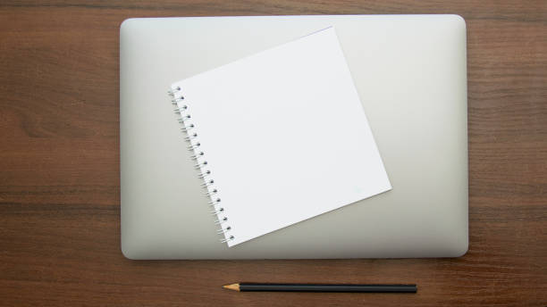 istock A beautiful pencil lies on a large notebook 1486507065