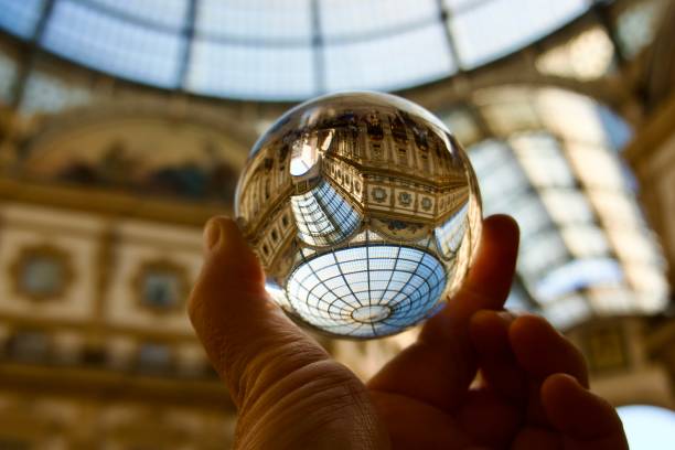 istock Crystal ball against glass ceiling 1486519283