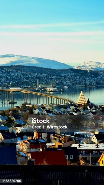 Scenic View Of The Tromso And The Arctic Cathedral In Norway From The Top Of A Hill Stock Photo - Download Image Now