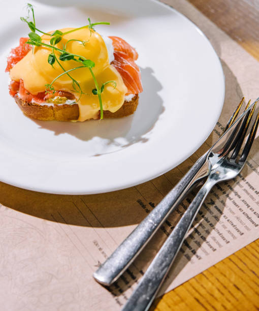 istock Egg benedict with hollandaise sauce and smoked salmon on toast 1486526585