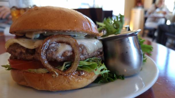 Greasy hamburger and salad