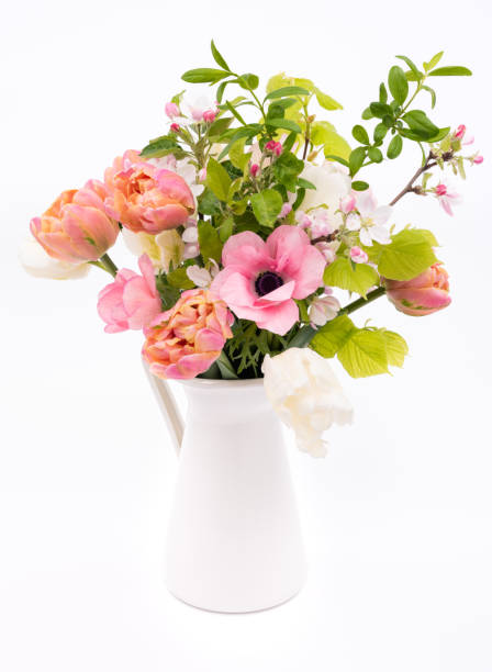 istock Elegant mixed pastel colored spring bouquet on white background with copy space. Spring tulips. Tulips bouquet. 1486528692