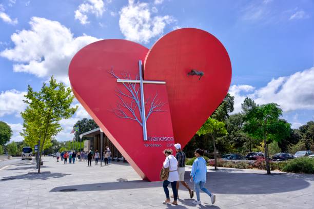 Fatima, Portugal - August 15, 2022: Commemoration of visit by Pope Francis to celebrate 100th anniversary of apparition of Our Lady with numerous tourists