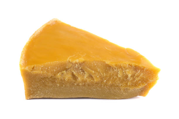 istock A piece of natural beeswax on a white background. 1486535731