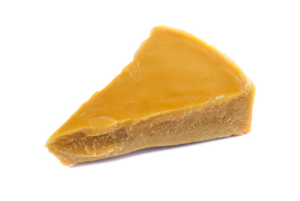 istock A piece of natural beeswax on a white background. 1486535738