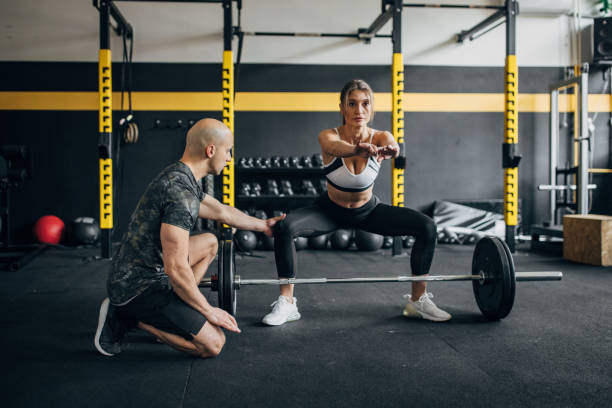 istock Woman exercising in gym 1486538544