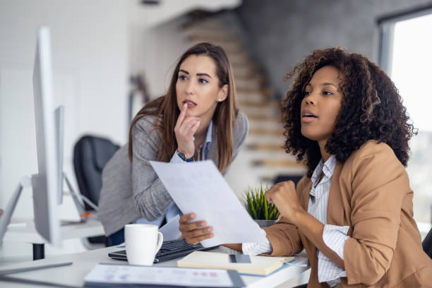istock Shot of two businesswoman working together on computer 1486538663