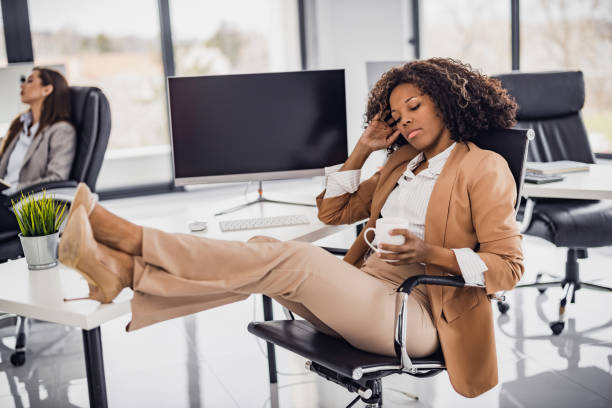 istock Female entrepreneur with computer working in modern office 1486539322