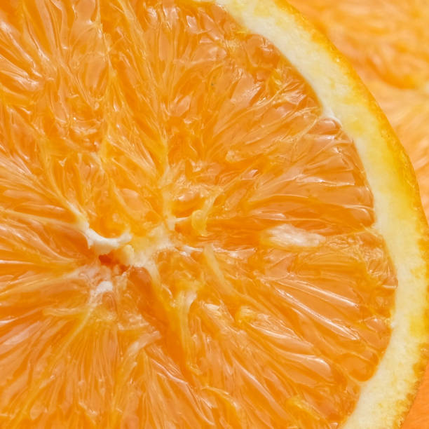 istock Juicy fresh orange in a cut close-up. 1486551691