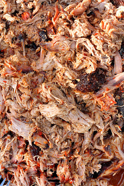 istock Barbecued pulled pork meat shredded after many hours of cooking 148655215
