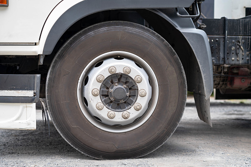 Front of a Big Truck Wheels Tires. Transportation Logistics. Industry freight truck transportation. Auto service.