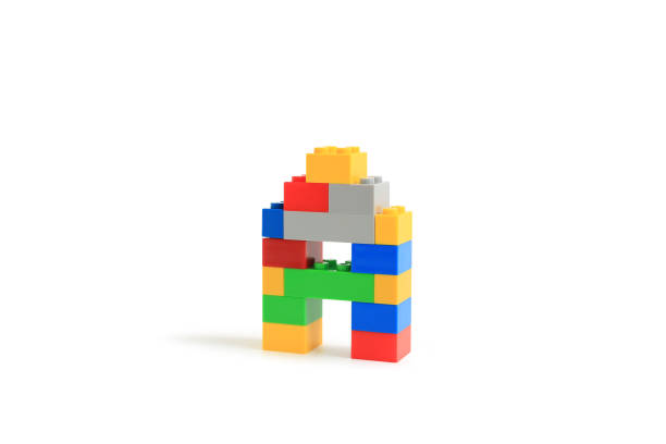 Alphabet letters A from colorful plastic brick block constructor isolated on white background. Image with Clipping path