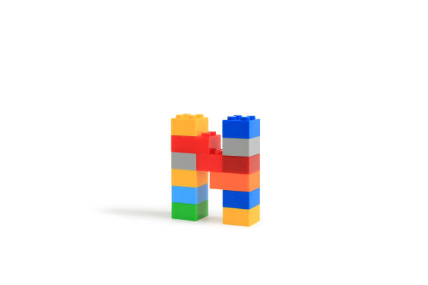 istock Alphabet letters N from colorful plastic brick block constructor isolated on white background. Image with Clipping path 1486554186