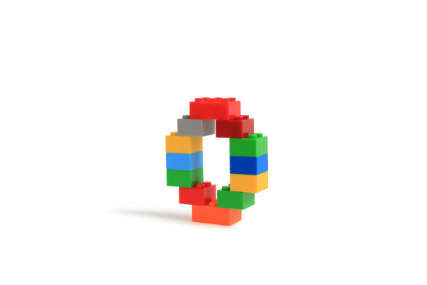 istock Alphabet letters O from colorful plastic brick block constructor isolated on white background. Image with Clipping path 1486554194