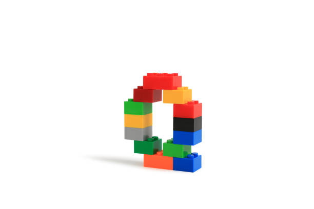 istock Alphabet letters Q from colorful plastic brick block constructor isolated on white background. Image with Clipping path 1486554206