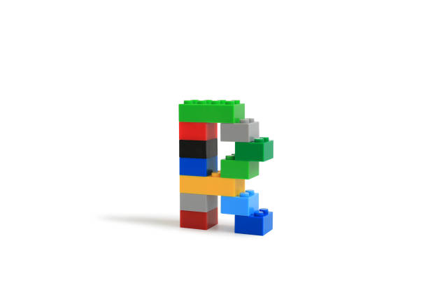 istock Alphabet letters R from colorful plastic brick block constructor isolated on white background. Image with Clipping path 1486554208
