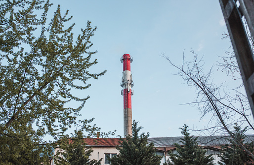 Daily shot and a close-up shot of the chimney and tower of the city's heating plant