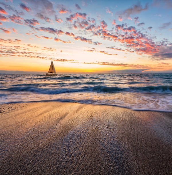 istock Sunset Sailboat Beautiful Ocean Vertical 1486561373