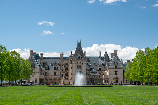 Asheville, NC, USA - April 28, 2023: Biltmore House, Châteauesque architectural-style Gilded Age mansion completed in 1895 for George Vanderbilt, listed in the National Register of Historic Places.