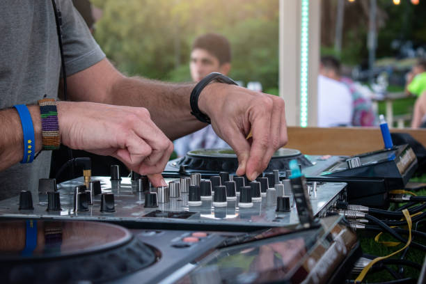 istock DJ at electronic party. dj music console. 1486564140