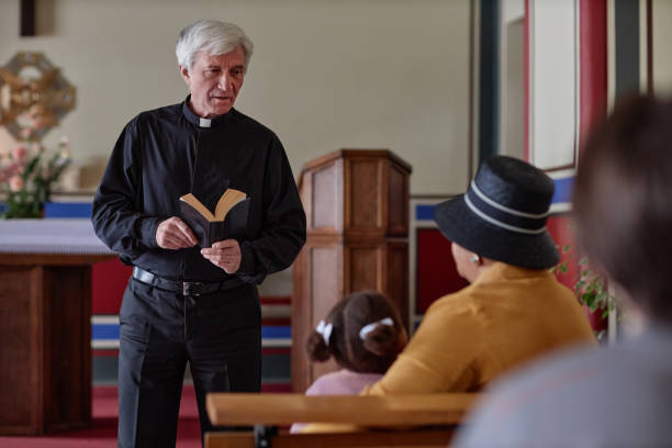 istock Priest reading sermon in the church 1486567433