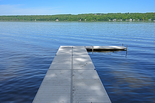 Pier on Messalonskee Lake, body of water in Belgrade Lakes region of Maine, United States