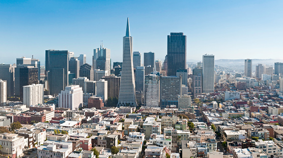 Aerial panoramic view across the low rise buildings of San Francisco's North Beach to the soaring modern landmarks of the downtown Financial District. ProPhoto RGB profile for maximum color fidelity and gamut.