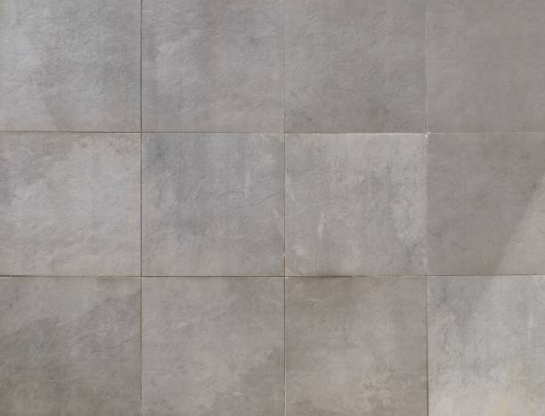 istock Elegant large gray square stone tiles. 1486569307