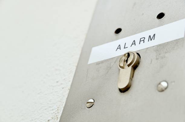istock Metal security door with a warning sign attached to the front 1486580618