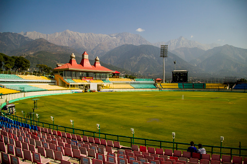 Nestled in the lap of the majestic Himalayan mountain range lies the quaint Dharamshala Cricket Stadium, also known as the Himachal Pradesh Cricket Association (HPCA) Stadium. Located at a height of 1,457 masl amidst the Dhauladhar mountain range in Kangra valley, it is one of the highest sports grounds in the world. Operated under the auspices of HPCA, the Cricket Stadium often serves as the practice ground for the Indian Cricket Team, Himachal Pradesh state-level cricket team, as well as Indian Premier League (IPL) team Kings XI Punjab.