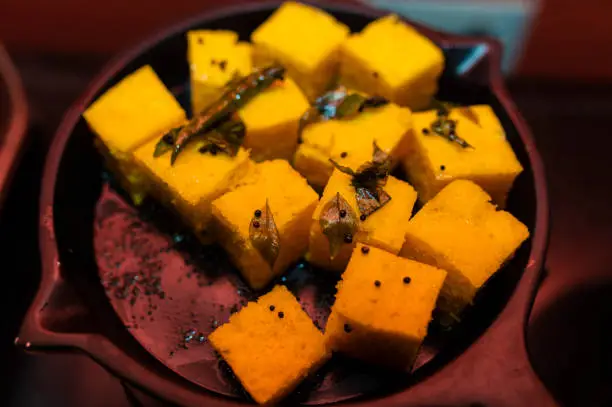 Photo of Dhokla in a bowl closeup food stock photo