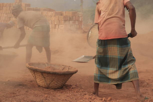 Islampur upazila, Jamalpur district, Bangladesh, 12 December 2019- Brick field worker working on dirty environment