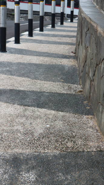 istock Traffic bollards on city street sidewalk. 1486595246