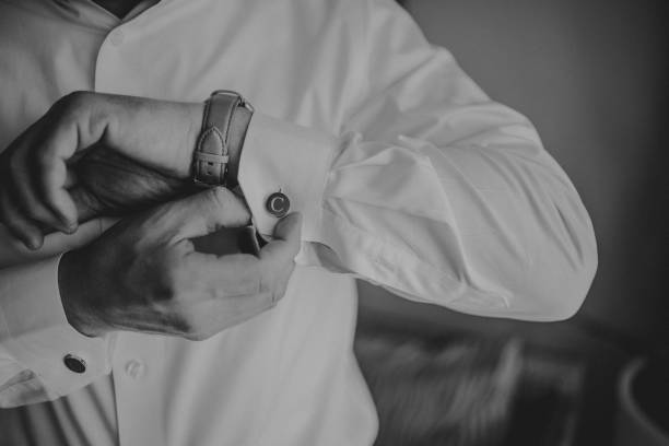 Businessman getting dressed