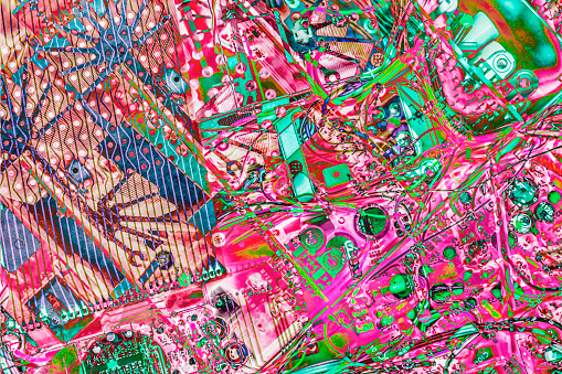 Colorful, vivid, stylized, surreal artistic representation of electronic circuit board elements.