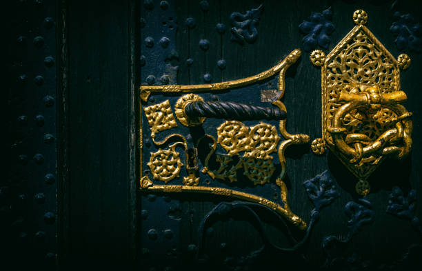 istock An old door with golden decoration 1486598592